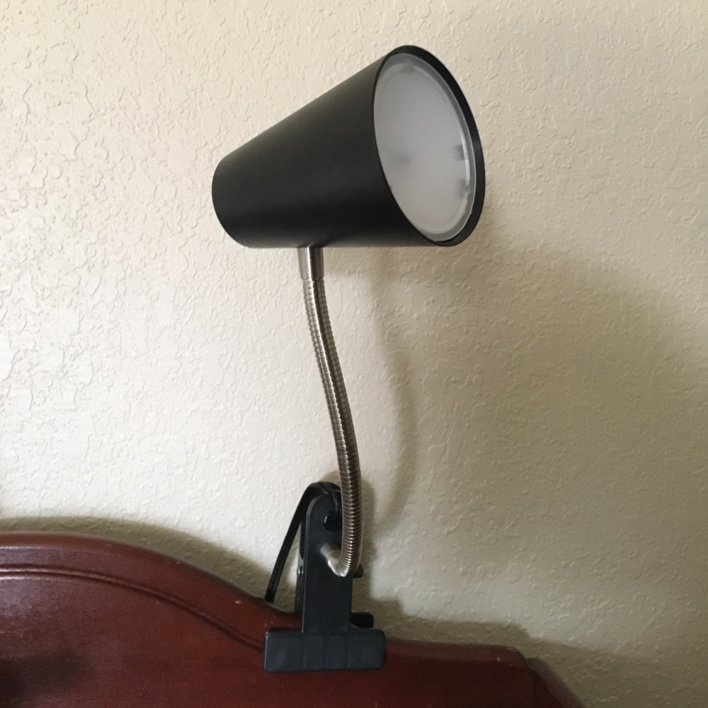 Lamp that clips onto bed